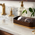 Bright Sunny Lifestyle Image of Italico Luxury Glasses Valet on a bathroom counter near a sink with glasses nested inside
