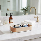 Bright Sunny Lifestyle Image of White Maple Italico Luxury Glasses Valet on a bathroom counter near a sink with black glasses nested inside